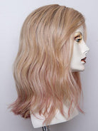Rose Blonde Rooted | Medium Dark Brown Roots that melt into a Pale Golden Blonde with a Mixture of Pink Tones Underneath