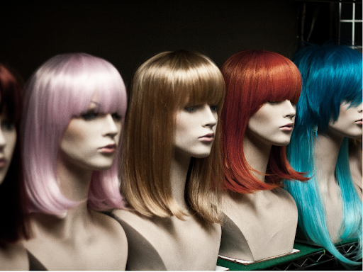 selection of different style women’s wigs (Image from Canva). 